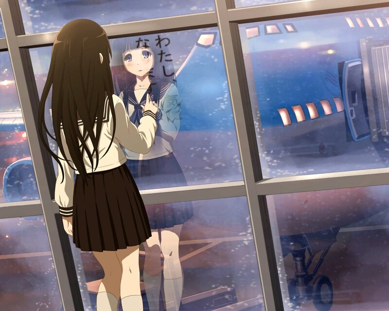 Girl looking at reflection in window
