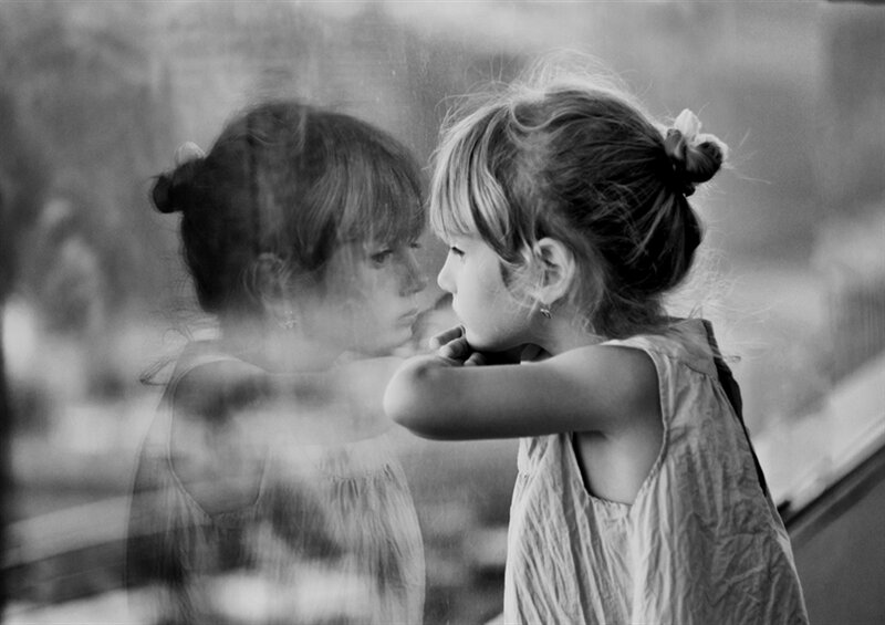 Girl Looking at Reflection