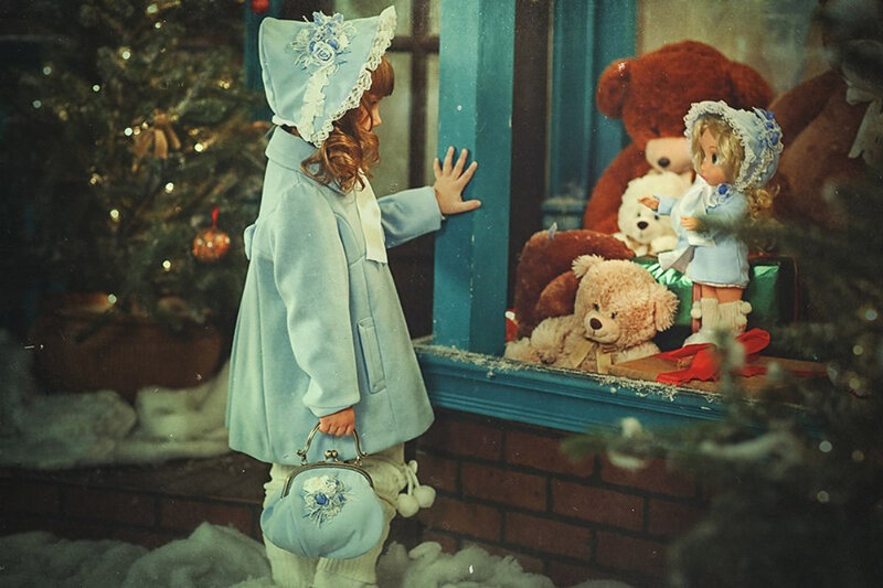 Girl Looking at Toy Window
