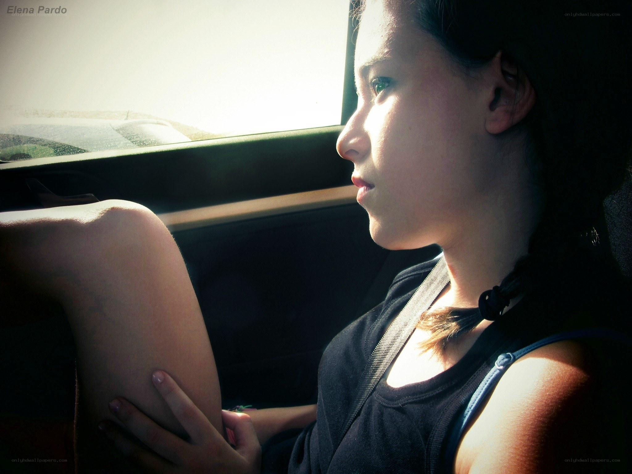 girl looking out car window