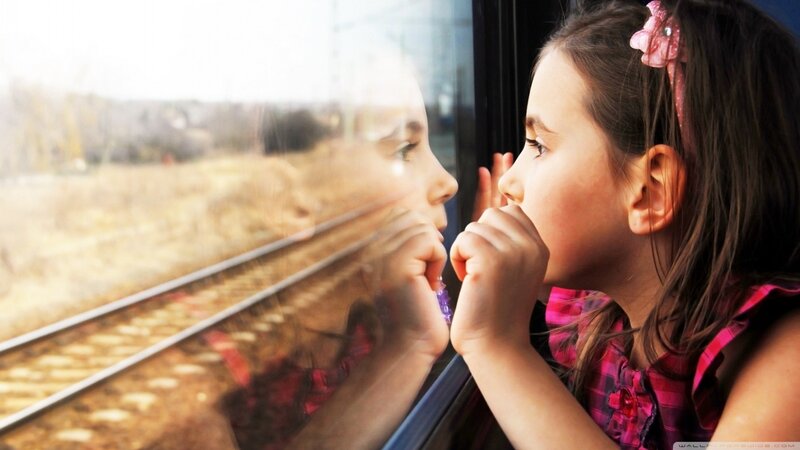 Girl Looking Out Train Window — Pink, Contemplative