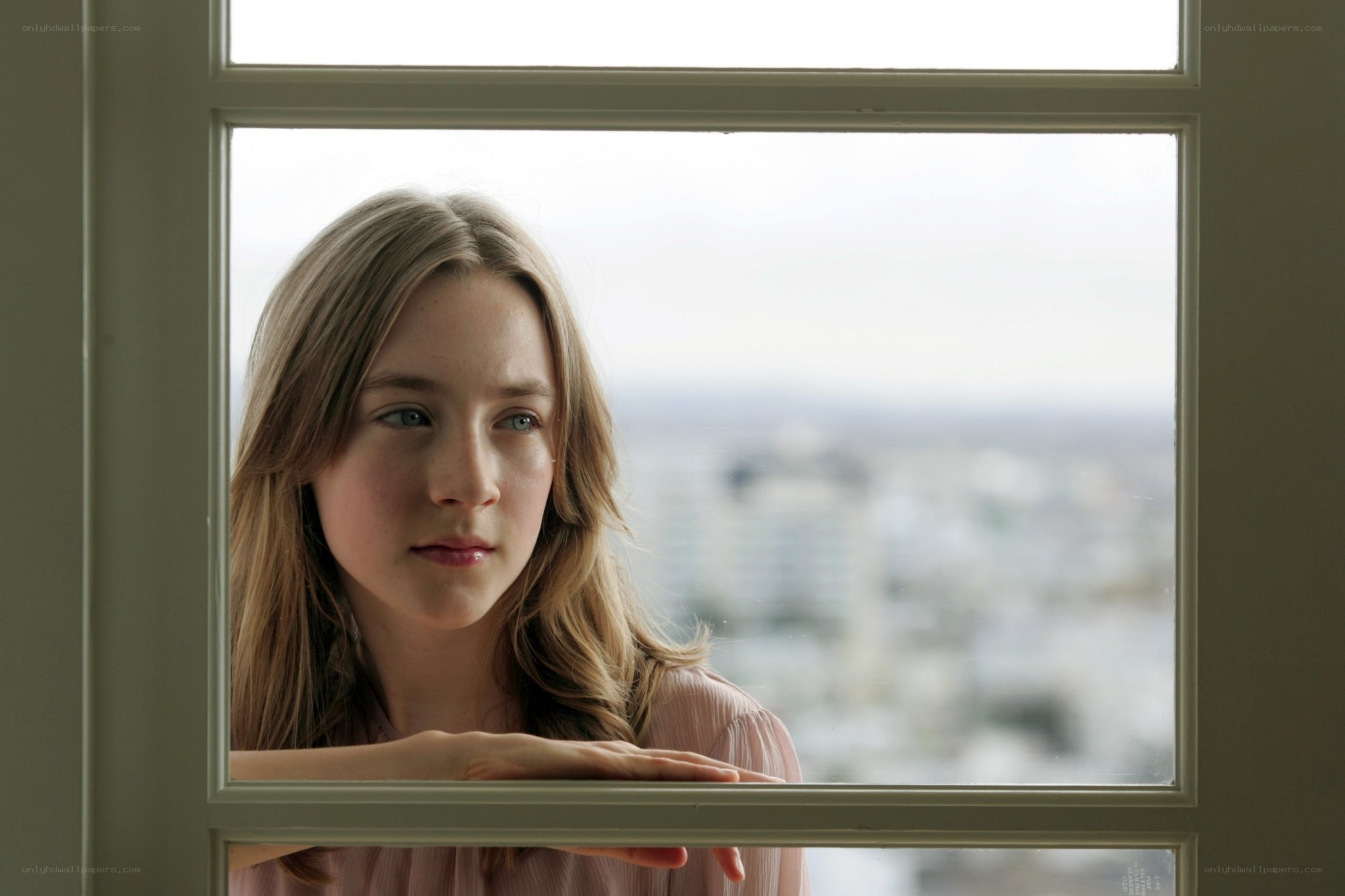 girl looking out window
