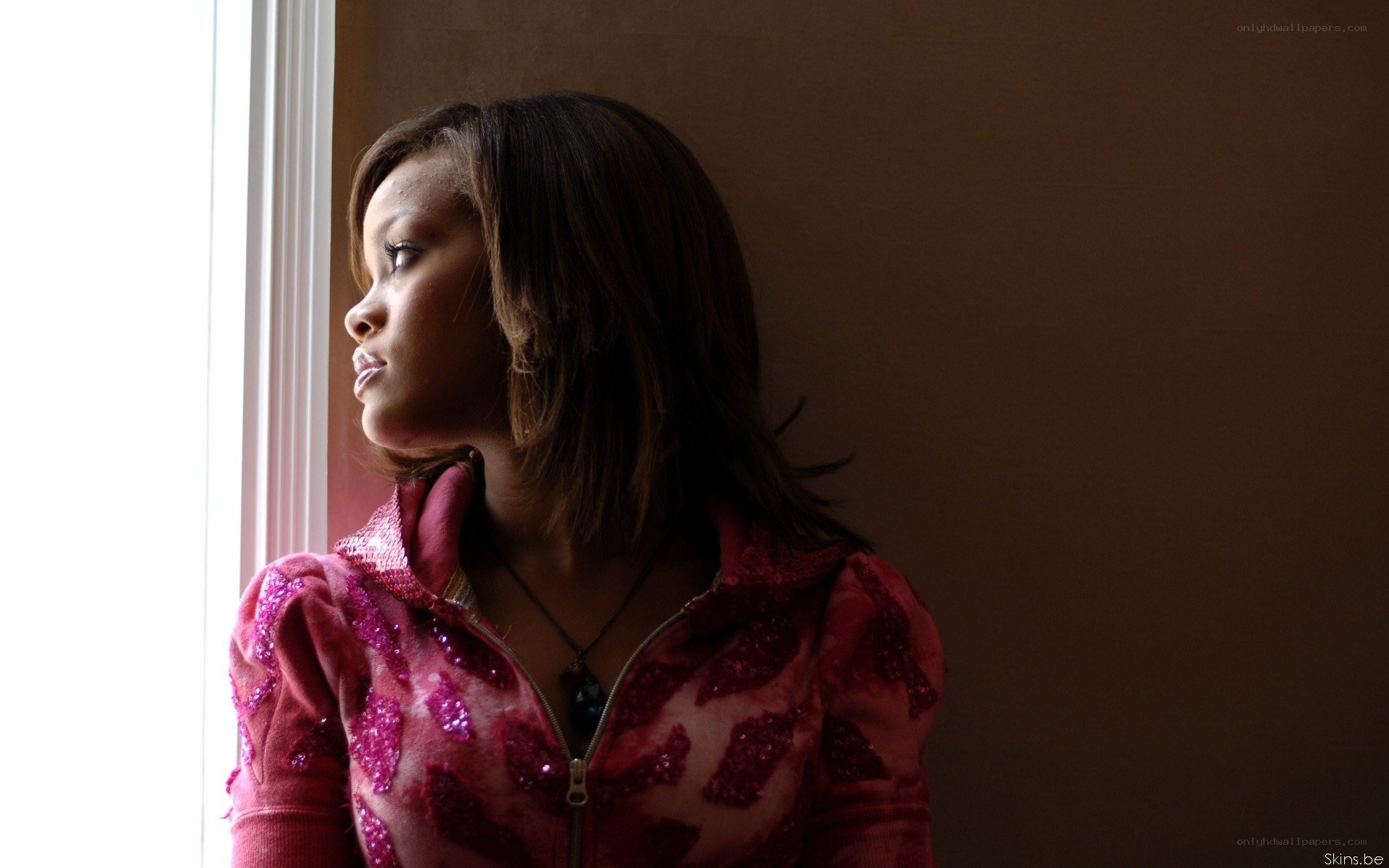 girl looking out window