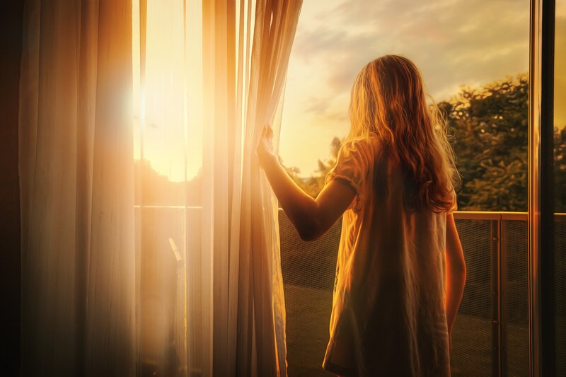 Girl Looking Out Window — Gold