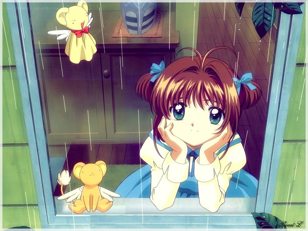 girl looking out window in rain