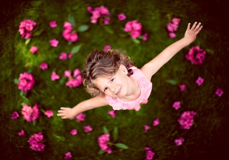 Girl Lying in Flowers — Green, Playful