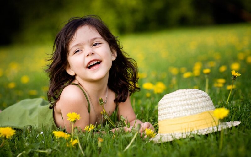 Girl Lying in Grass — Green, Joyful