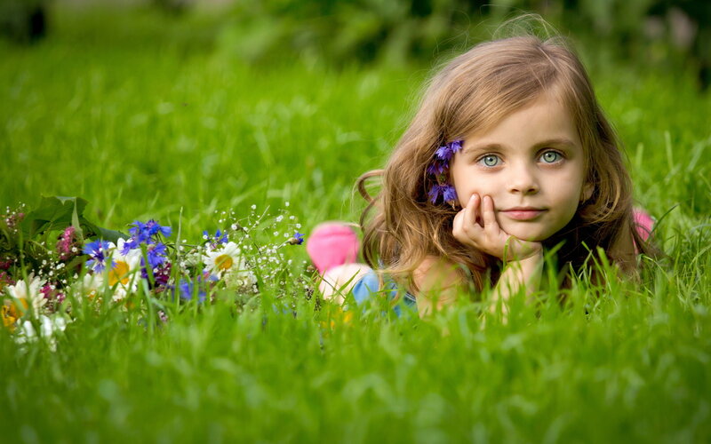 Girl Lying in Grass — Green, Serene