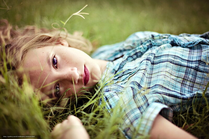 girl lying in grass