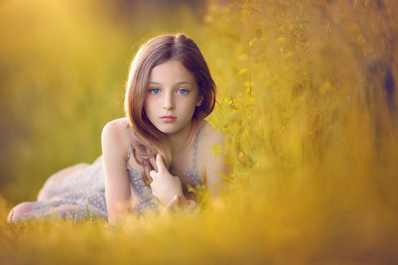 Girl Lying in Grass — Yellow
