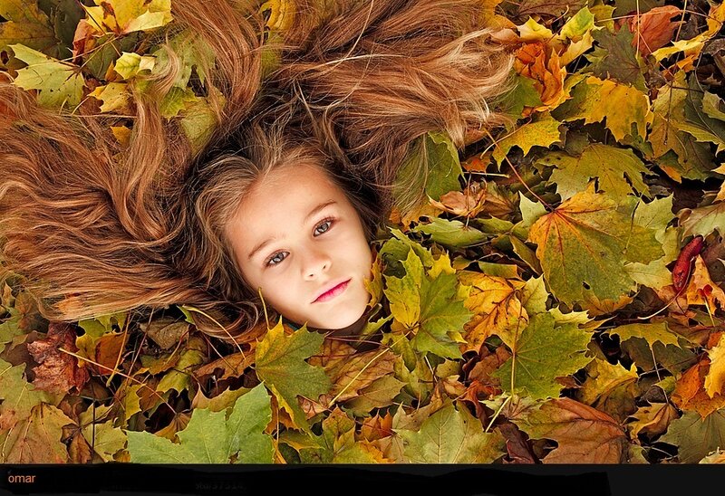 Girl Lying in Leaves