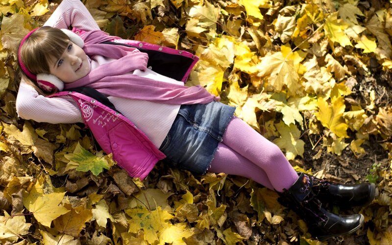 Girl Lying in Leaves — Yellow, Calm