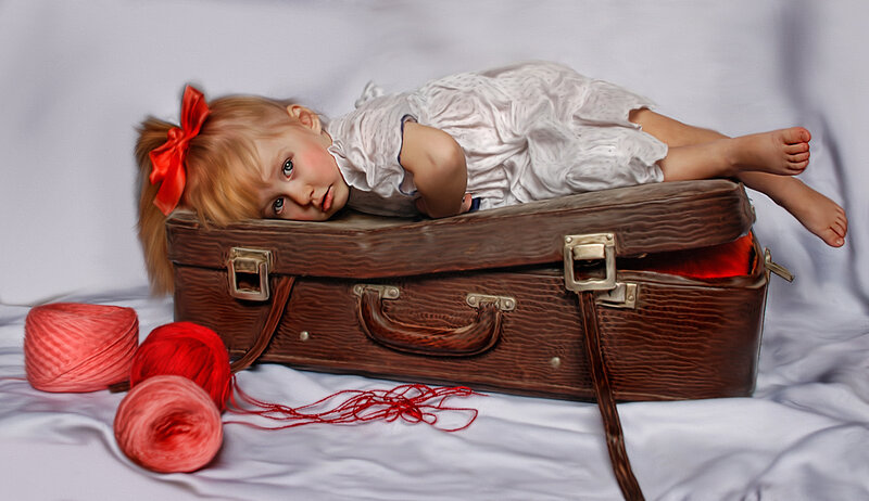 Girl Lying in Suitcase