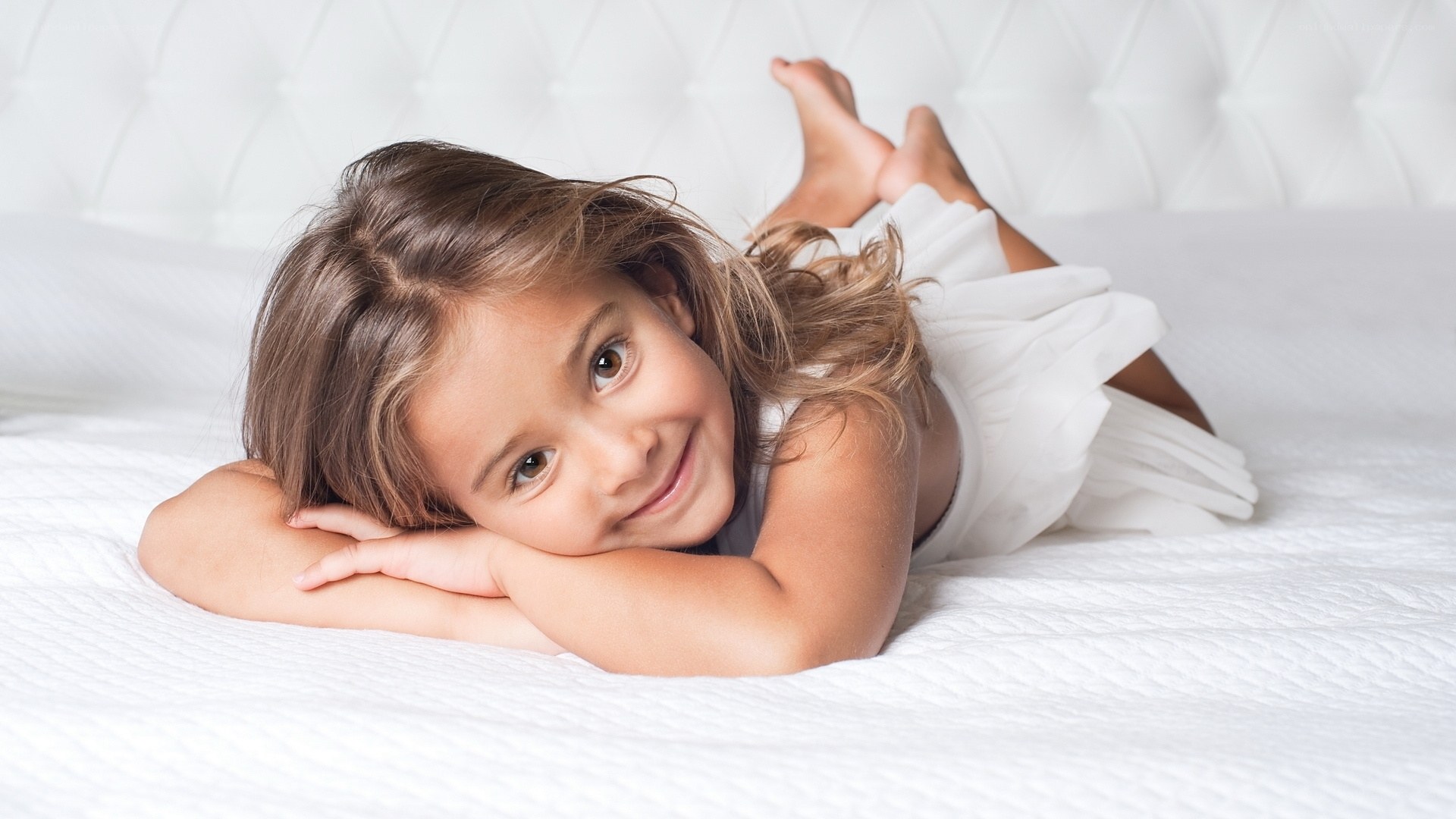 girl lying on a bed