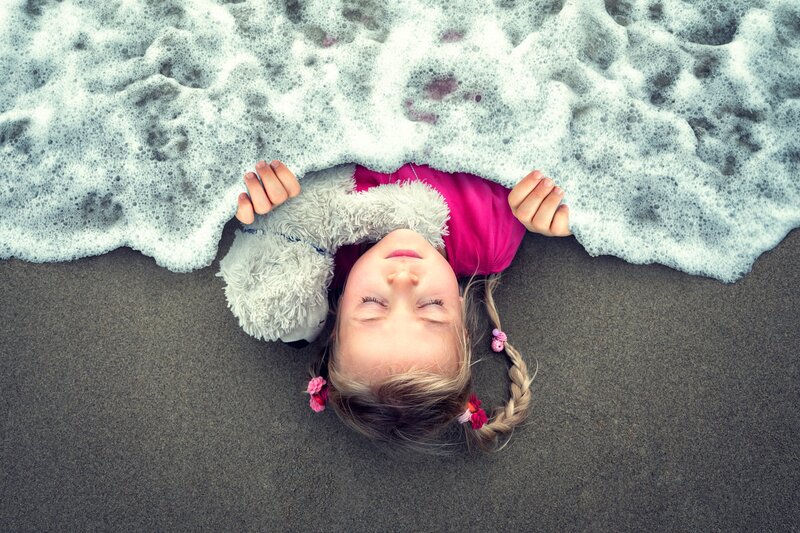 Girl Lying on Beach