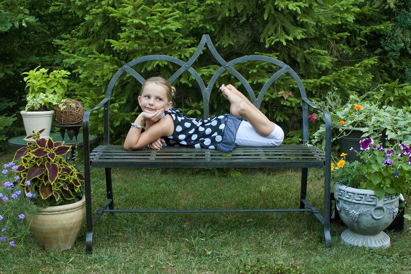 Girl Lying on Bench — Green