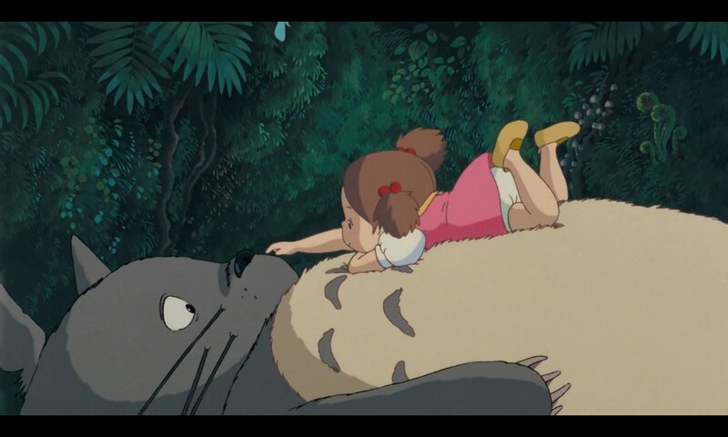 Girl Lying on Cat