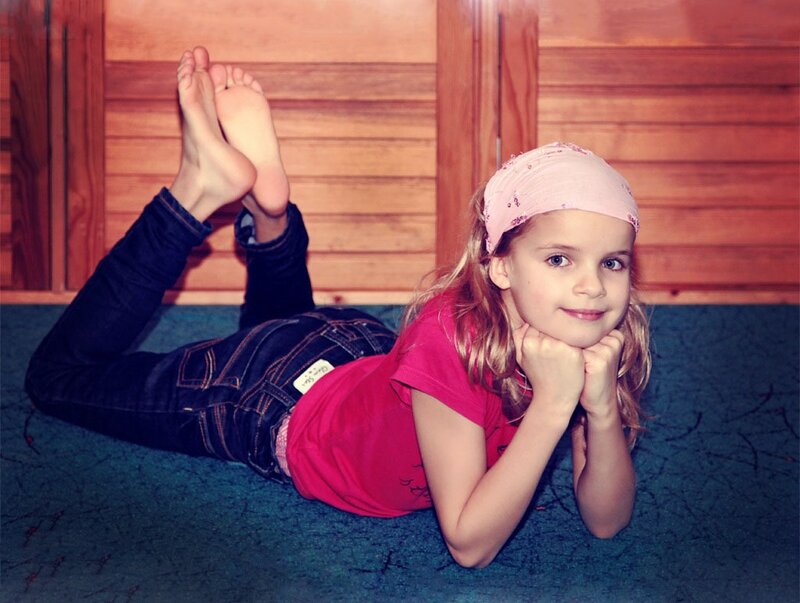 Girl Lying on Floor — Pink