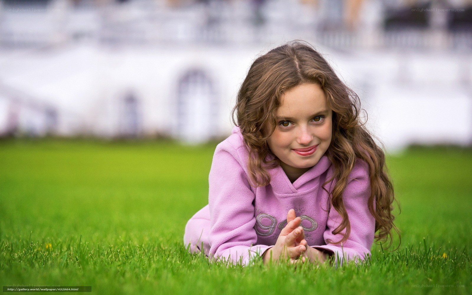 girl lying on grass