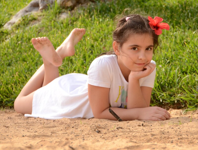 Girl Lying on Grass — Green, Calm