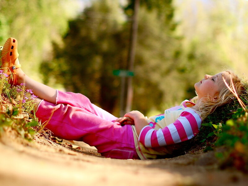 Girl Lying on Grass — Pink