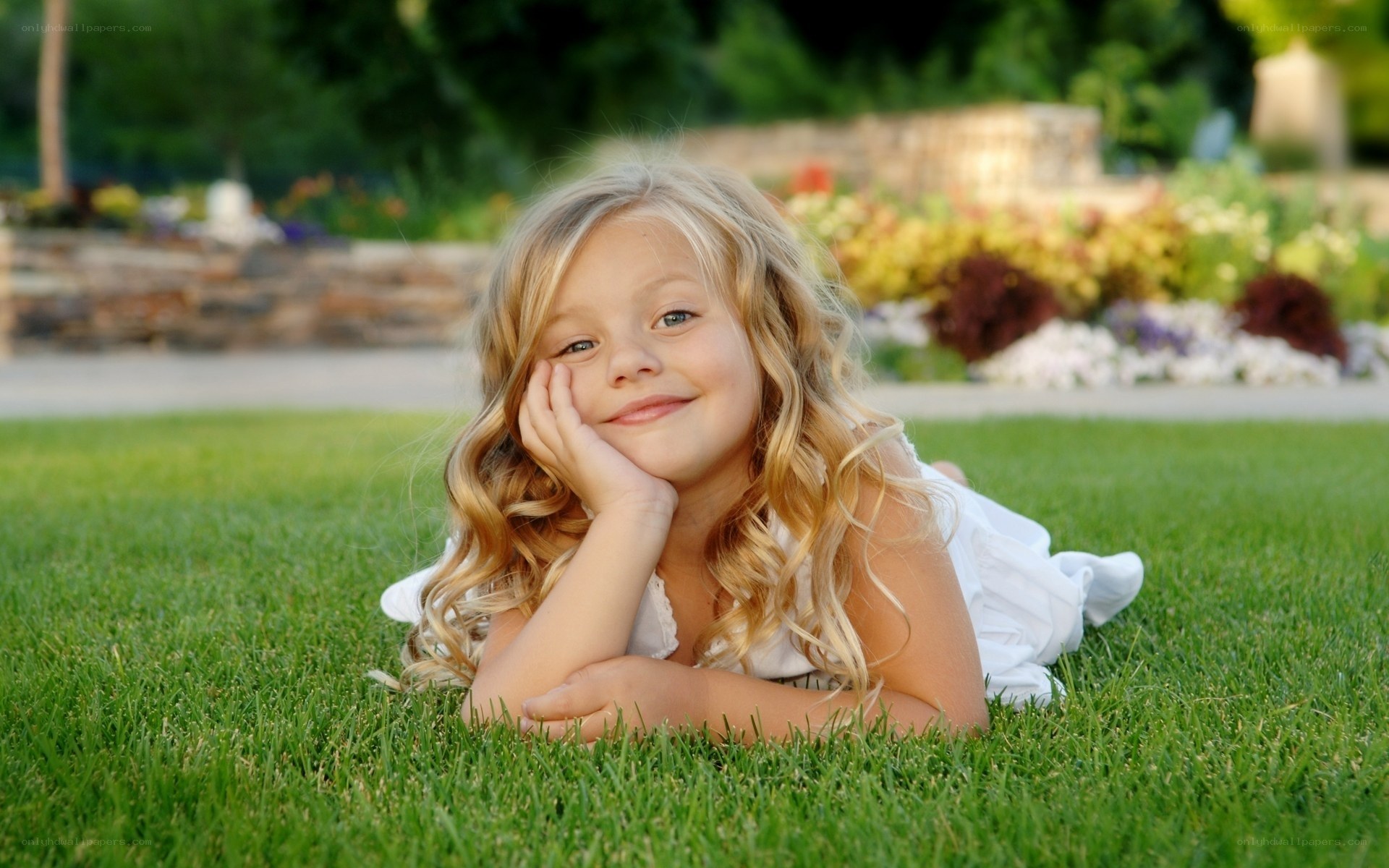 girl lying on grass