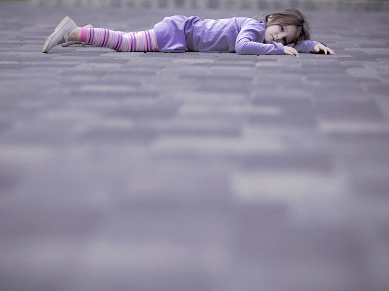Girl Lying on Pavement — Purple