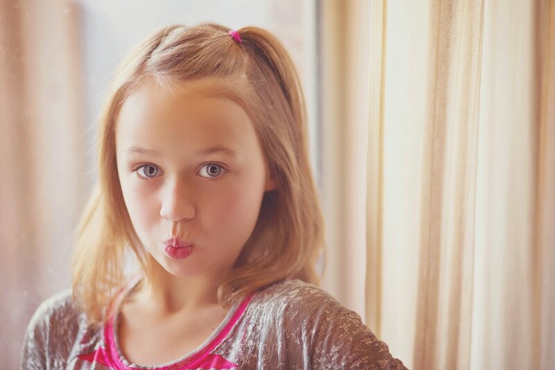 Girl Making a Kiss Face