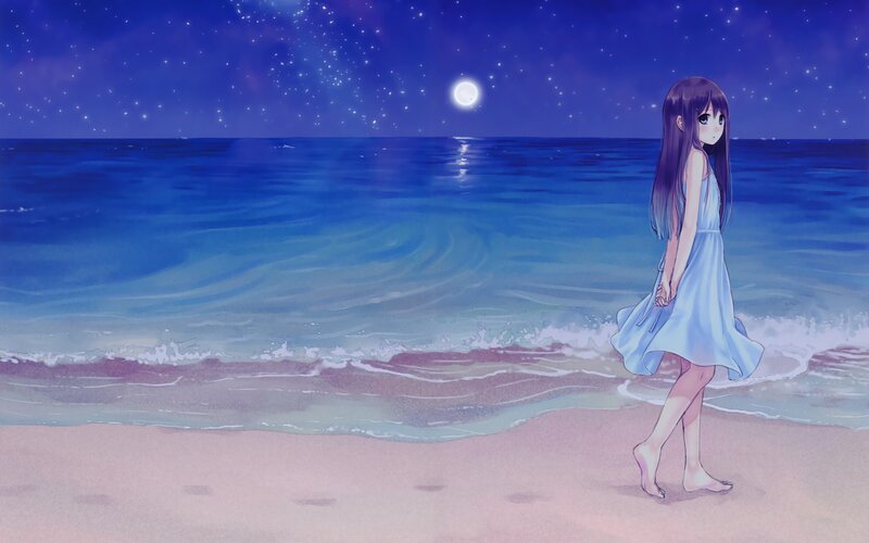 Girl on a beach at night