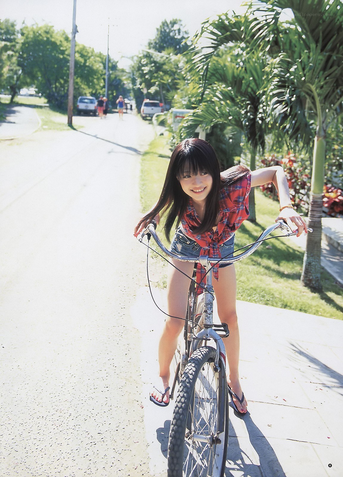 Girl on a bicycle smiling