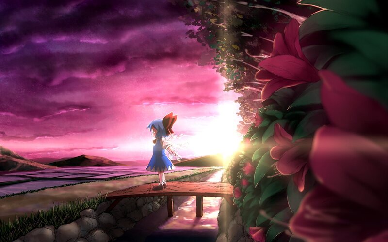 girl on a bridge at sunset