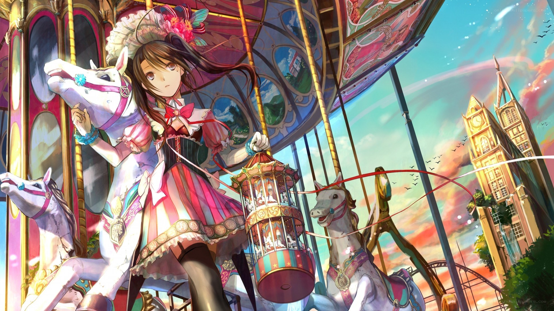girl on a carousel at sunset