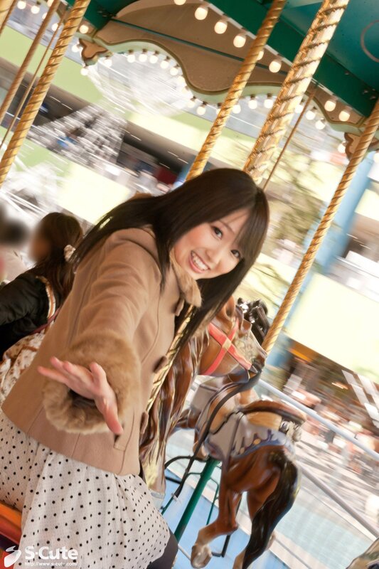 Girl on a carousel ride