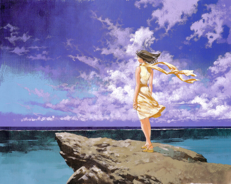 Girl on a cliff overlooking the sea