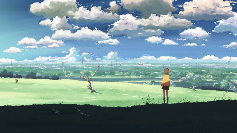 Girl on a hill overlooking the landscape