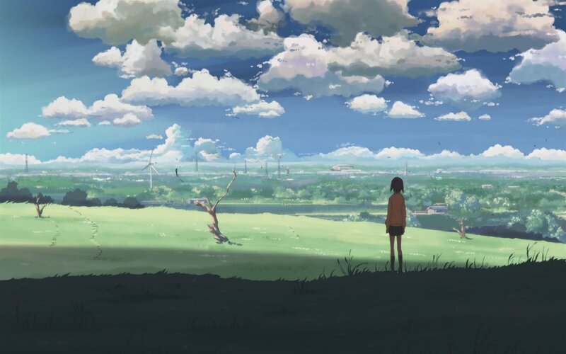 Girl on a hill overlooking the valley