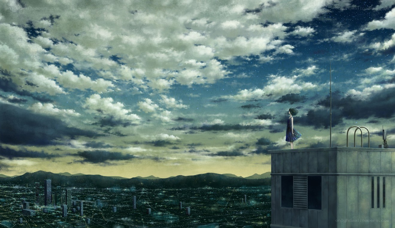 Girl on a rooftop at night