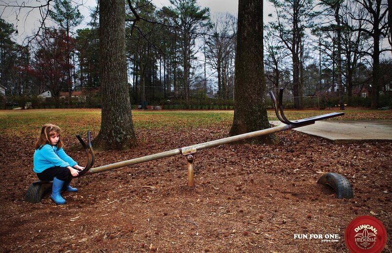 Girl on a seesaw