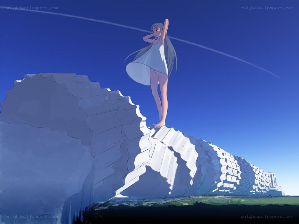 Girl on a stone wall