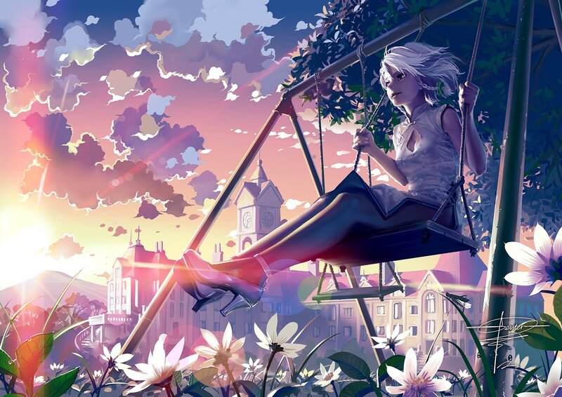 Girl on a swing at sunset