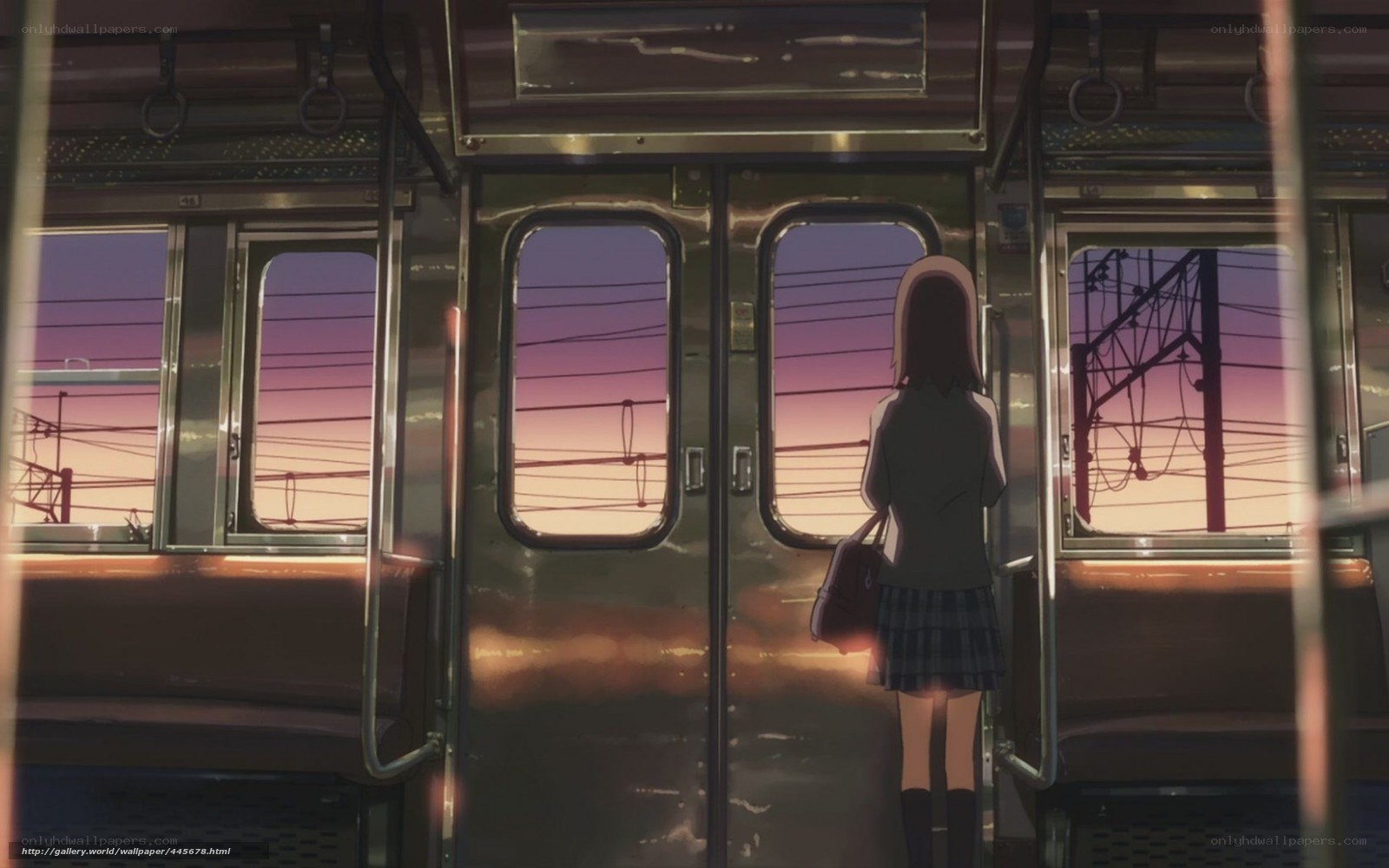 Girl on a train at sunset
