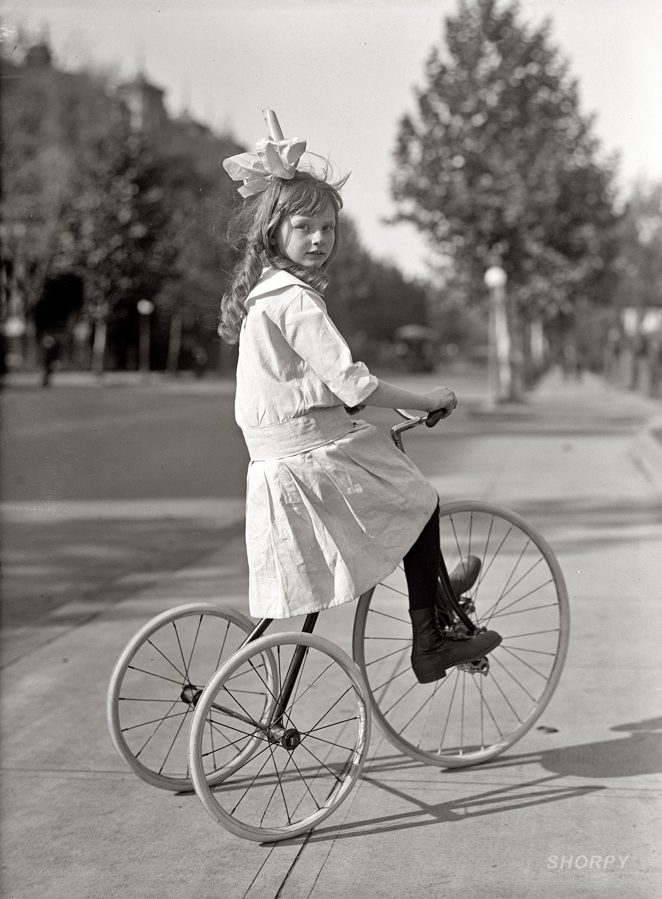Girl on a tricycle