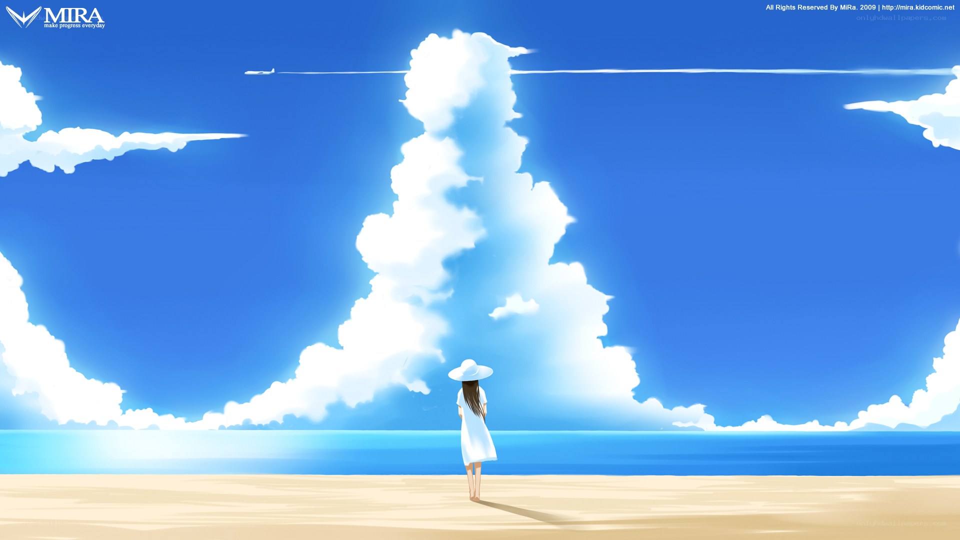 Girl on beach watching clouds