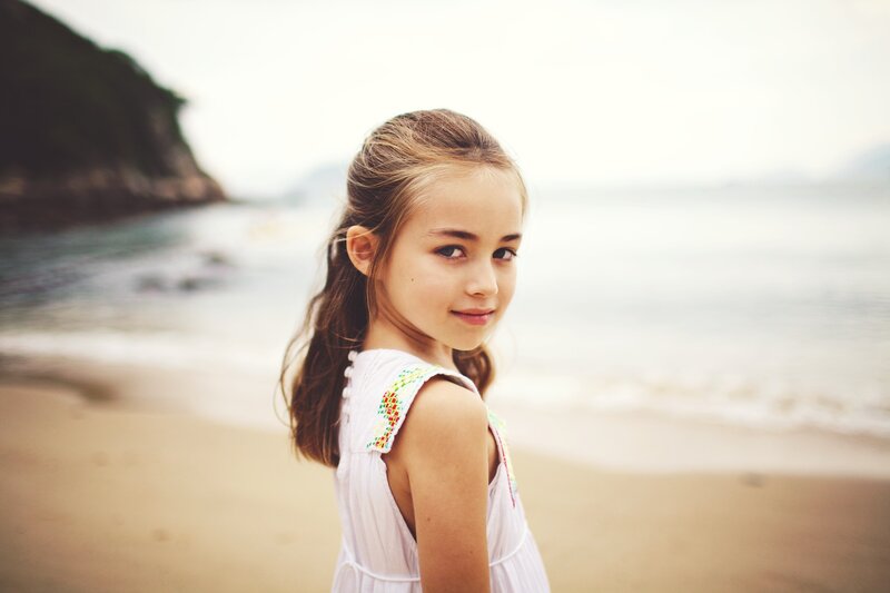 Girl on Beach — White