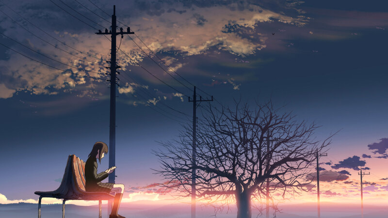 Girl on bench at sunset