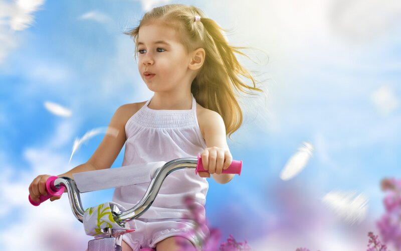 Girl on Bicycle — Blue, Serene