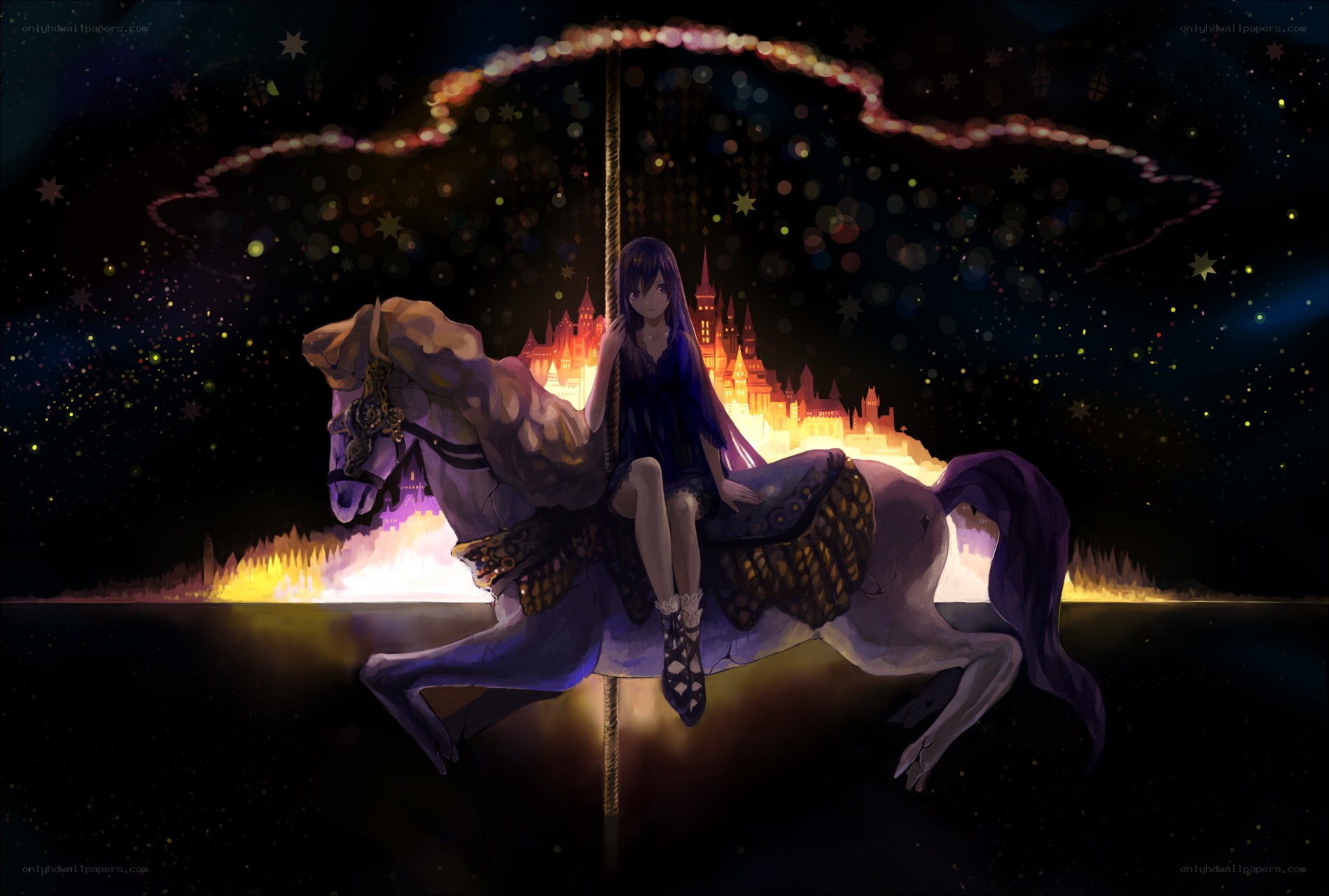 girl on carousel at night