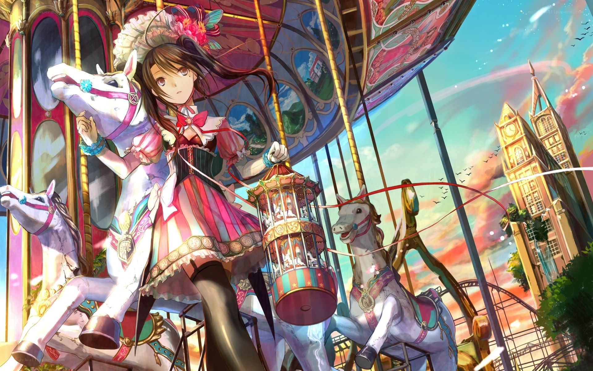 girl on carousel at sunset