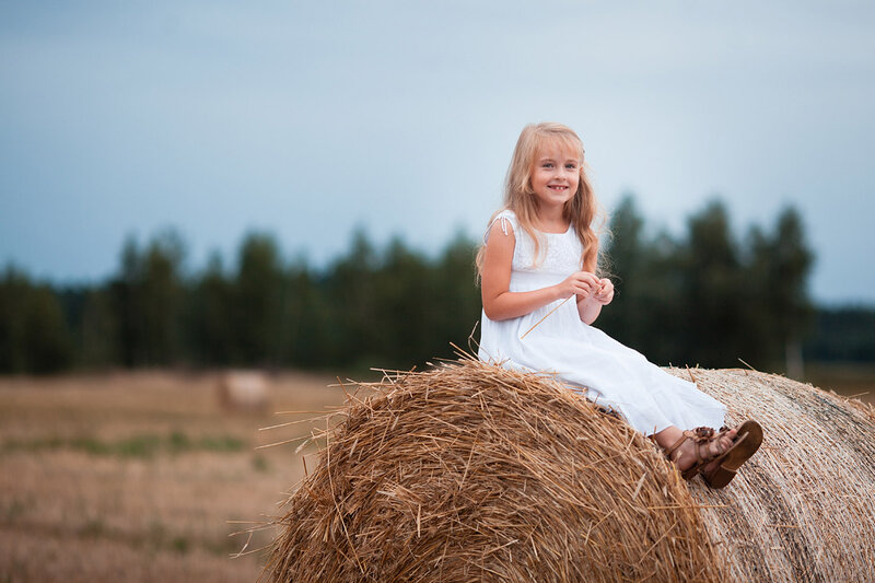 Girl on Hay Bale