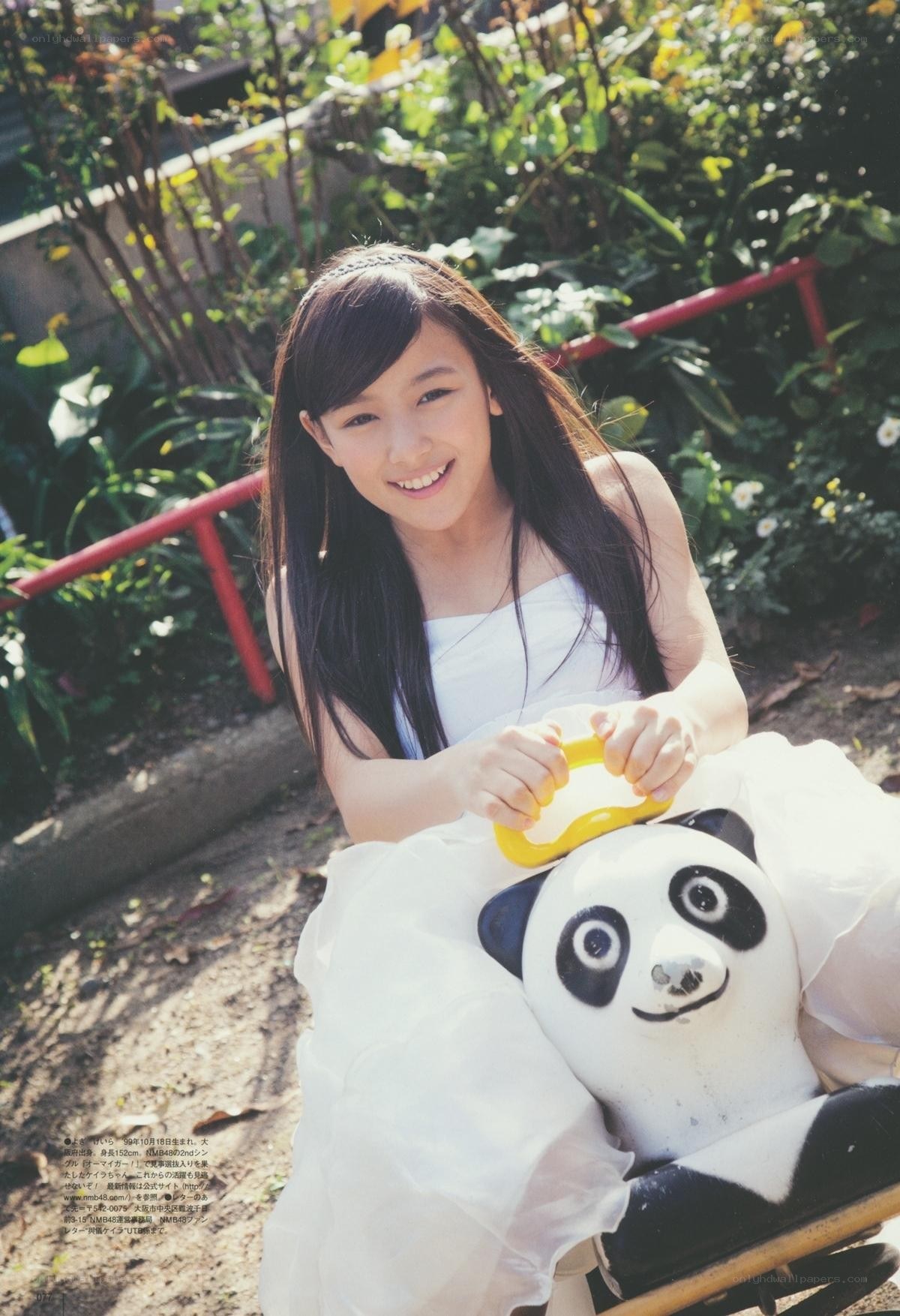 Girl on panda ride